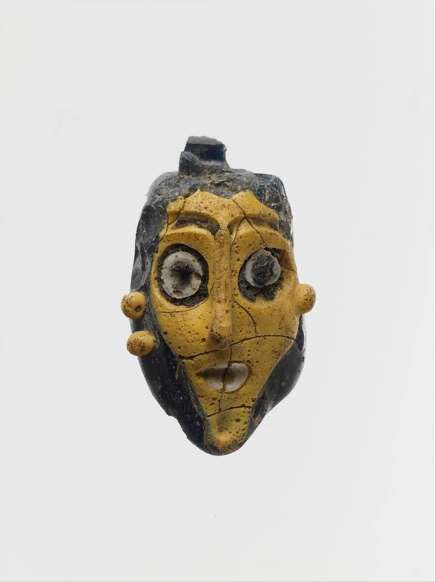 Glass head pendant — Unknown