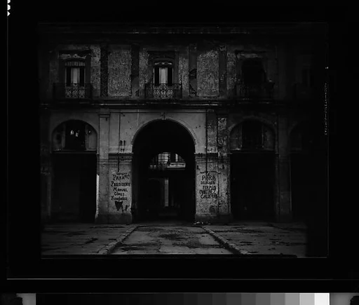 [Courtyard Colonnade Façade with Political Wallwriting, Havana]