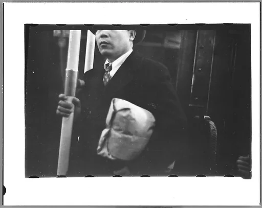 [Four 35mm Film Frames: Subway Passengers, New York City]