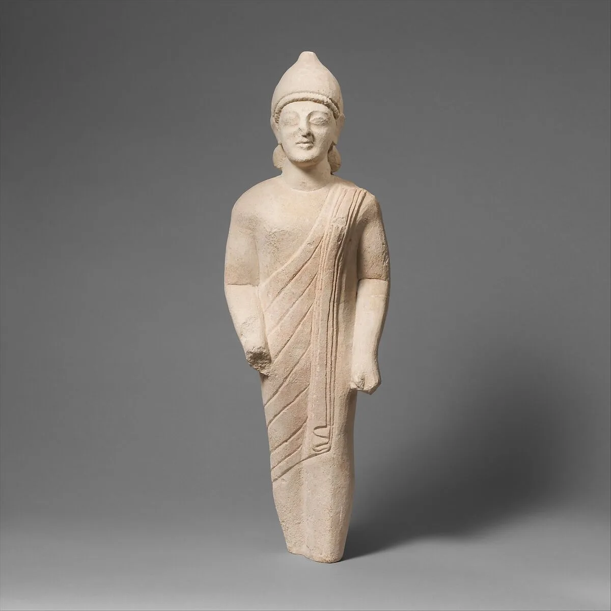 Limestone statuette of a male votary (worshipper) — Unknown