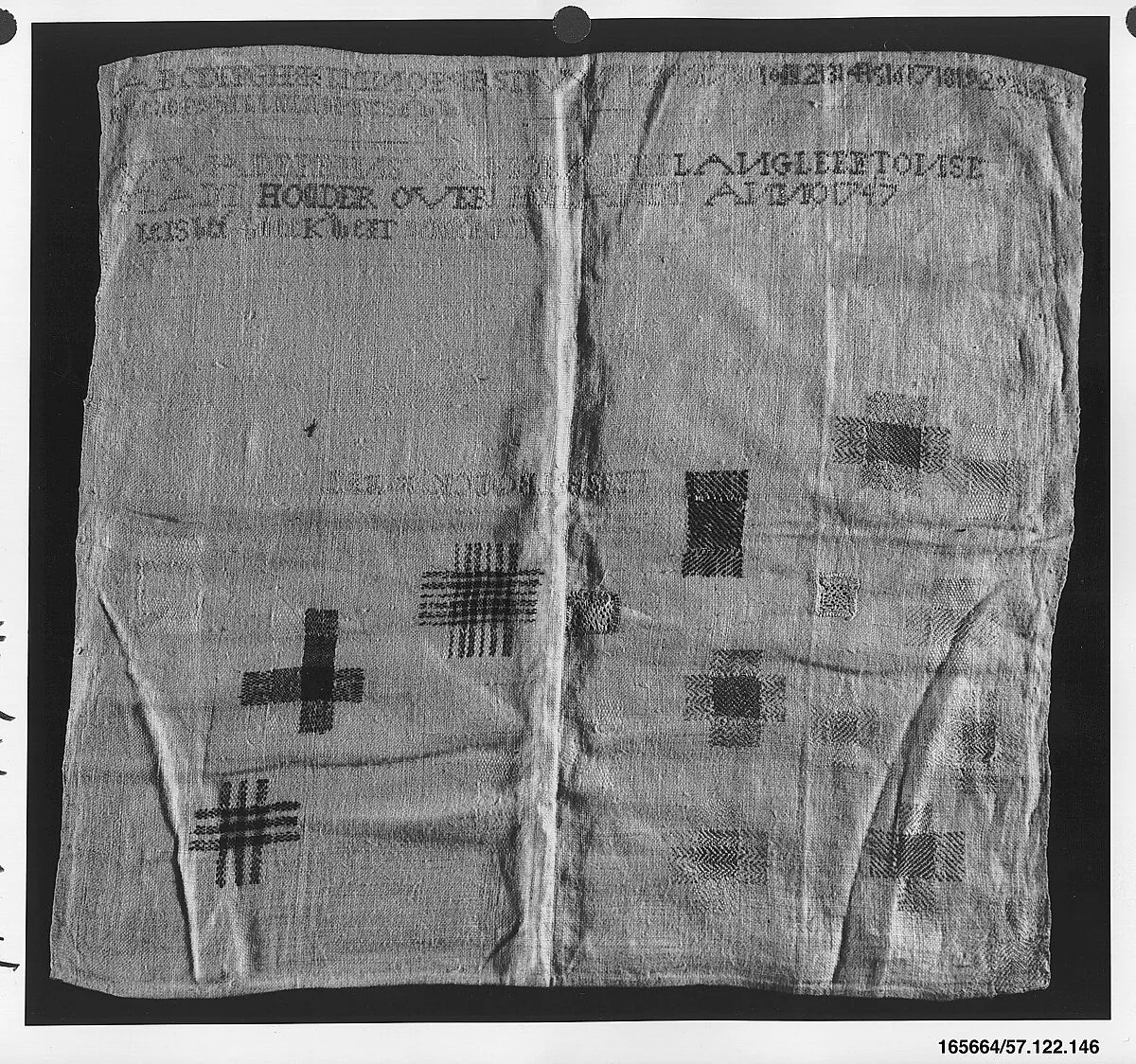 Embroidered darning sampler — Unknown