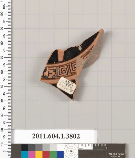 Terracotta fragment of a kylix (drinking cup)