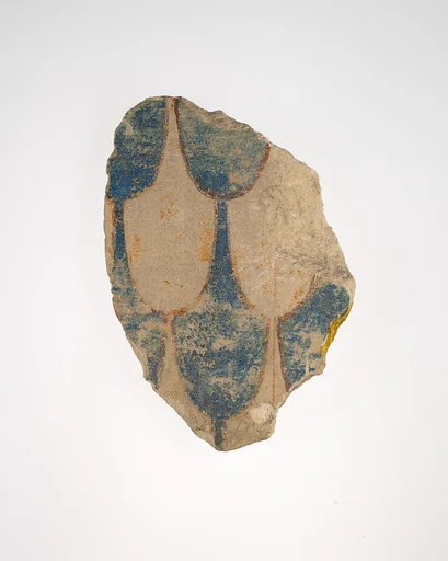 Fragment from a wall with painted feather pattern