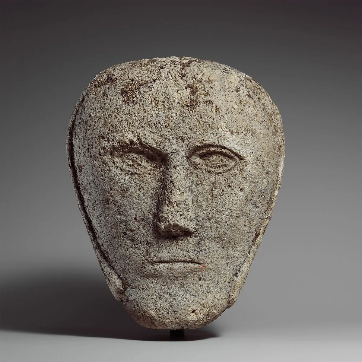 Head of a Man Wearing a Cap or Helmet — Unknown