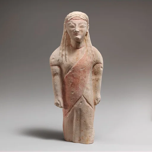Limestone statuette of beardless male votary in Greek dress