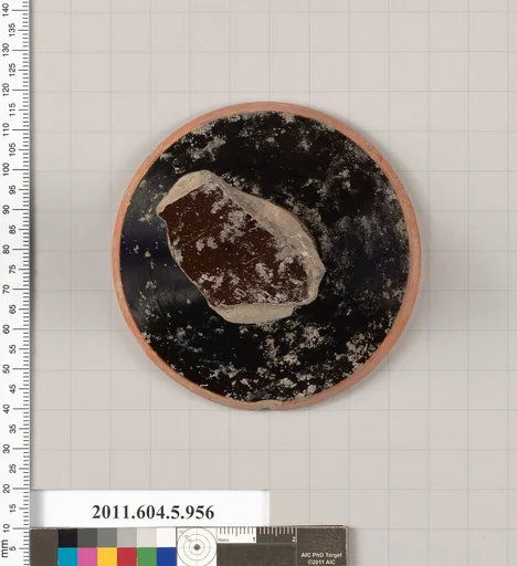 Terracotta fragment of a kylix (drinking cup)