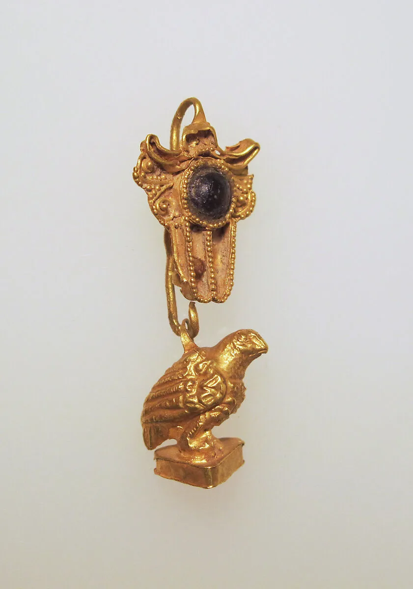 Earring with hawk pendant — Unknown
