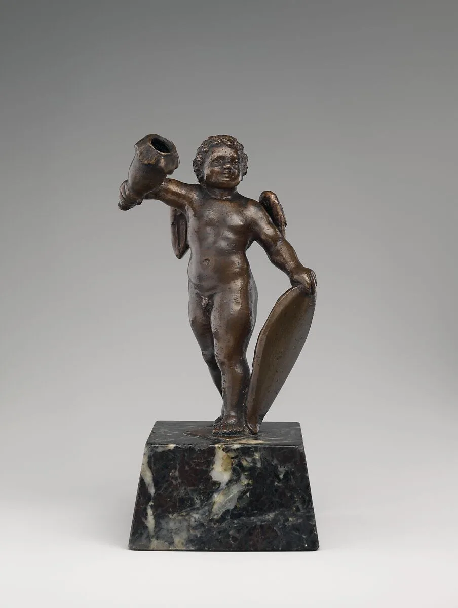 Cupid holding a candle socket — Unknown