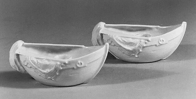 Pair of boat-shaped candlesticks — Unknown