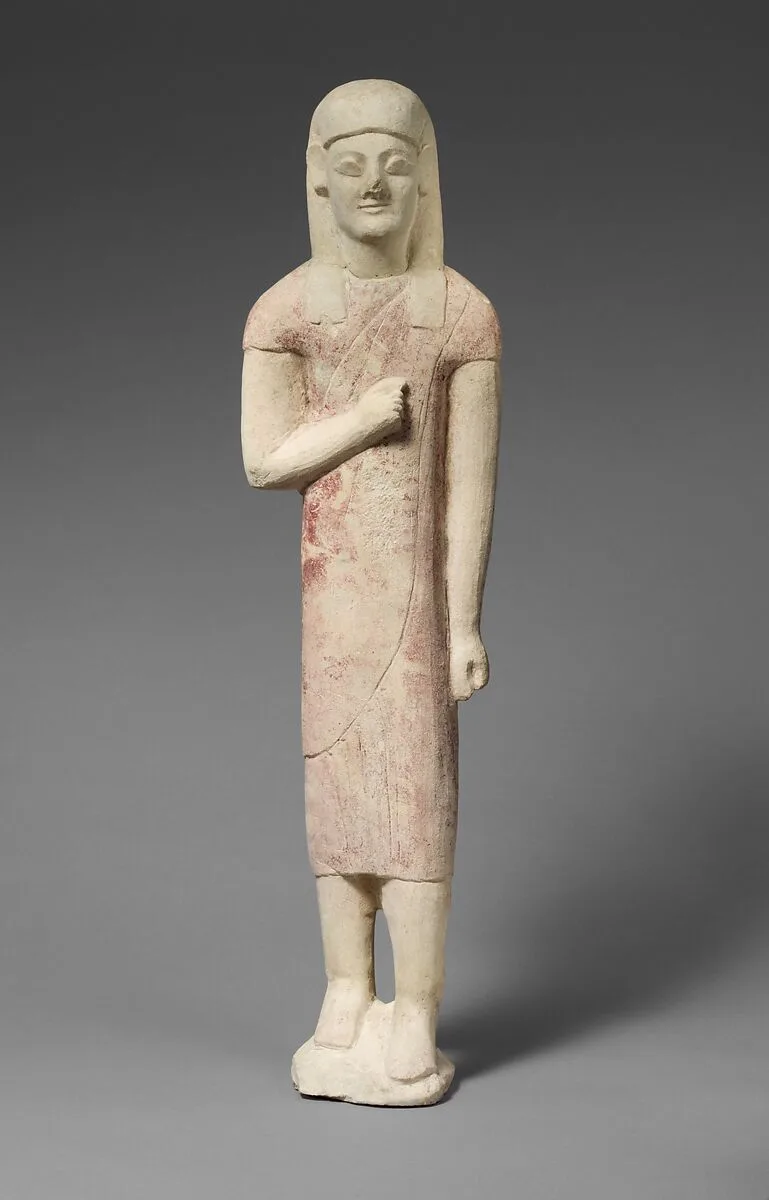 Limestone statuette of a beardless male votary in Greek dress — Unknown