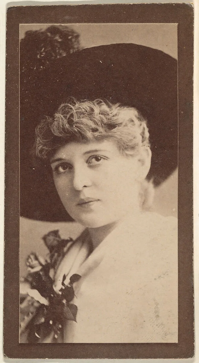 Portrait of actress wearing dark wide-brimmed hat, from the Actresses series (N668) — Unknown