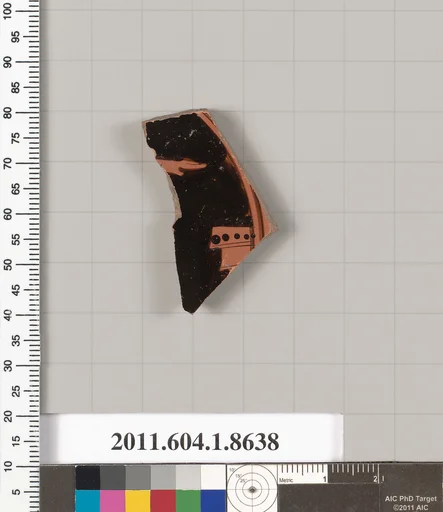 Terracotta fragment of a stemless kylix (drinking cup)