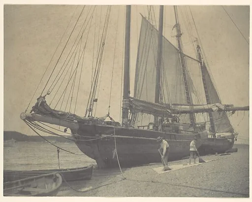 [Ships on a Beach with Two Long Boats and Two Men Sweeping]