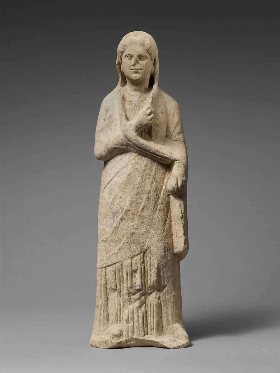 Limestone statuette of a female votary — Unknown