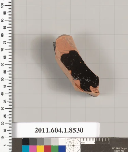 Terracotta fragment of a stemless kylix (drinking cup)