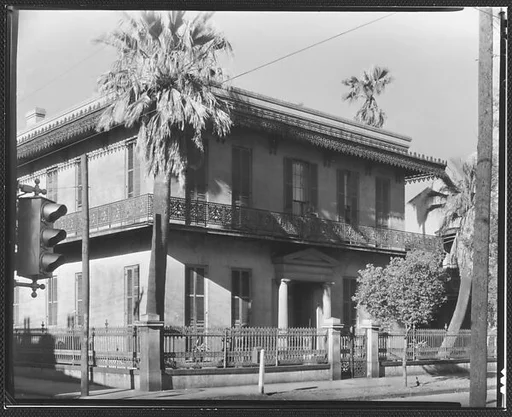 [Stone Town House with Cast-Iron Balconies and Fence in French Quarter, Esplanade Avenue, New Orleans, Louisiana]
