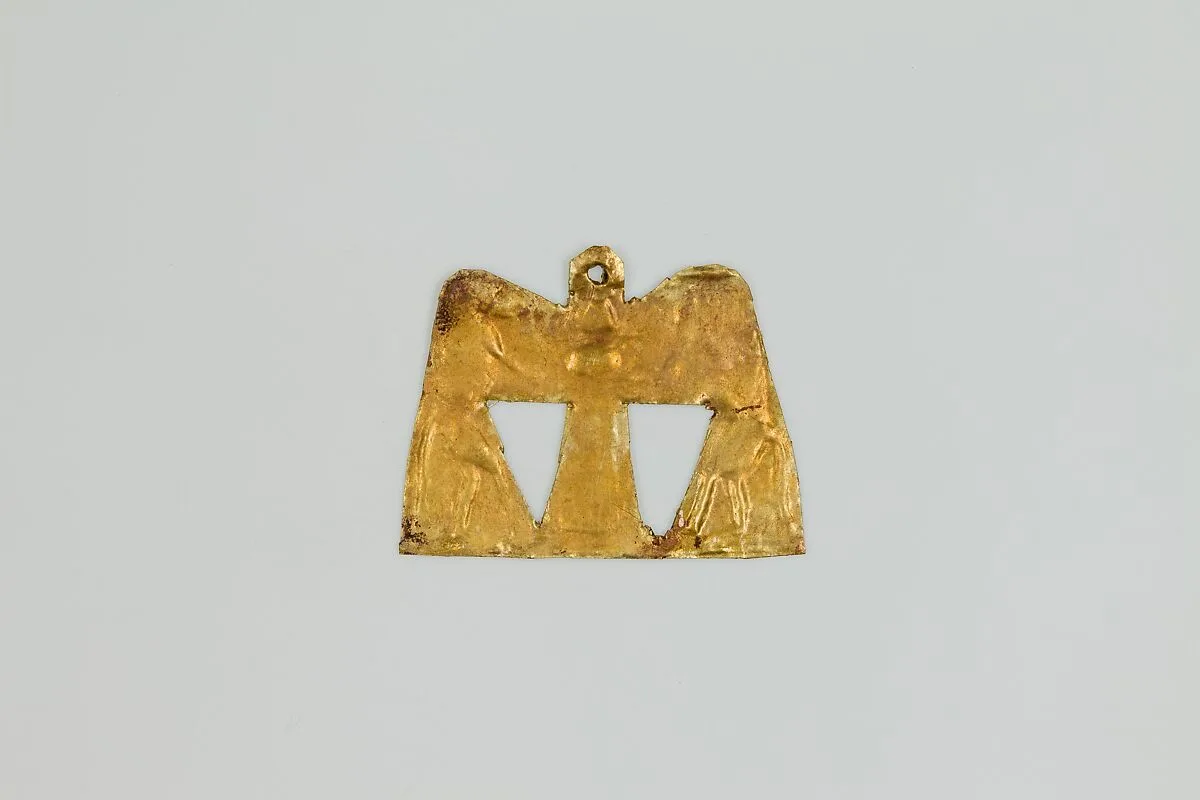 Amulet depicting two baboons flanking a djed pillar with sundisk and atef-crown — Unknown