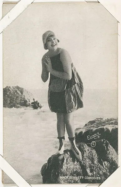 Bathing beauty on rock clasping hands from Mack Sennett Comedies Arcade series (W423) — Unknown
