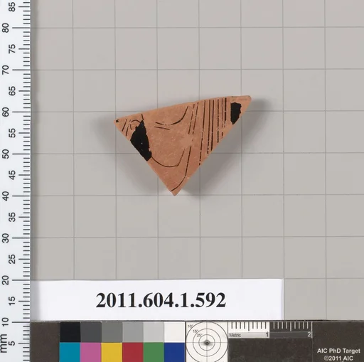Terracotta fragment of a kylix (drinking cup)