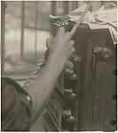 [Male Model Posed Pulling a Rope in Anna Huntington's Rooftop Studio]