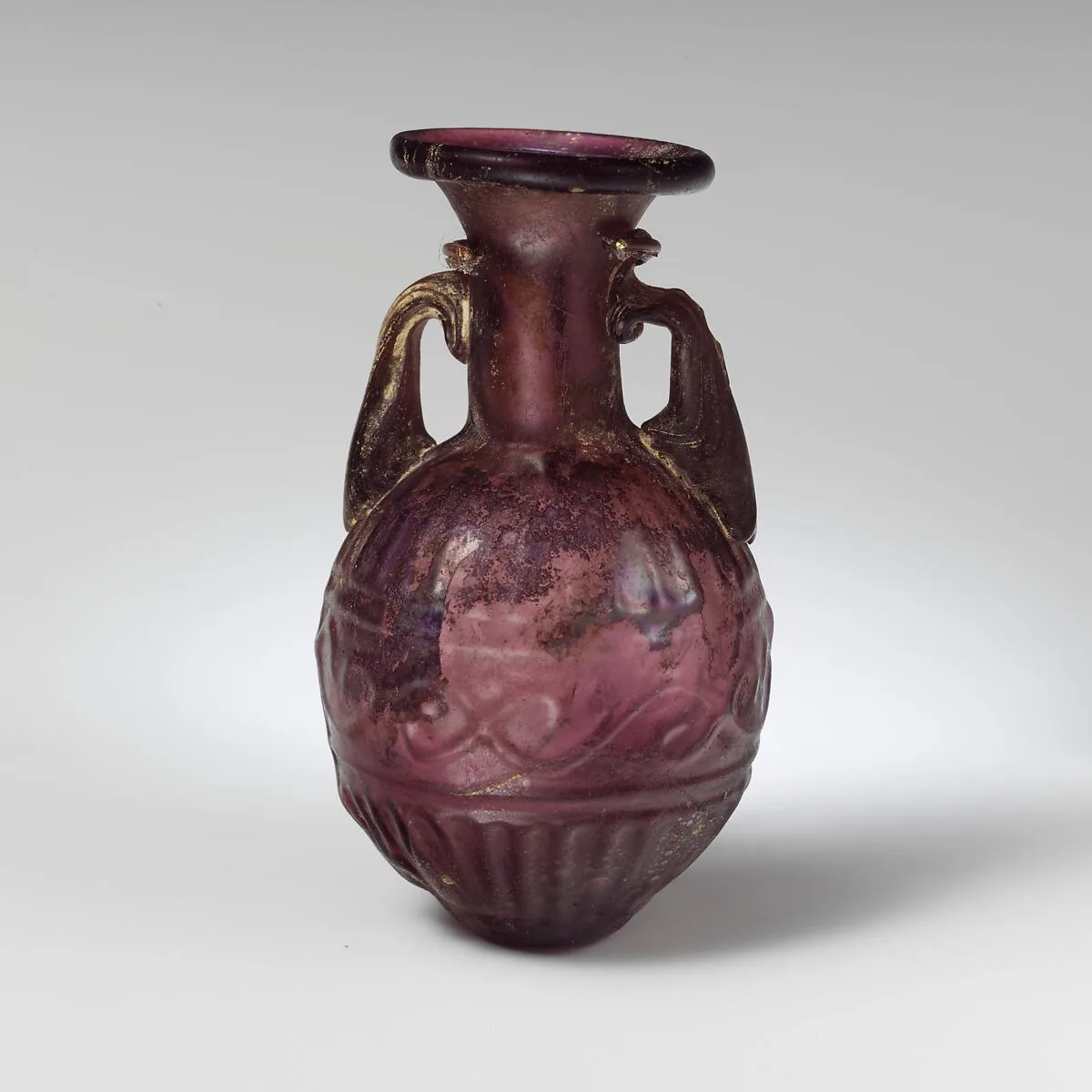 Glass amphoriskos with band of scrolls — Unknown
