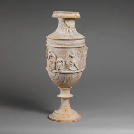 Terracotta vase with relief decoration