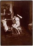 Nude Combing Her Hair — Unknown