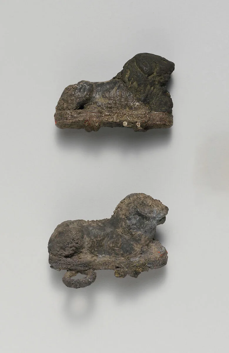 Two silver clasps with lions — Unknown