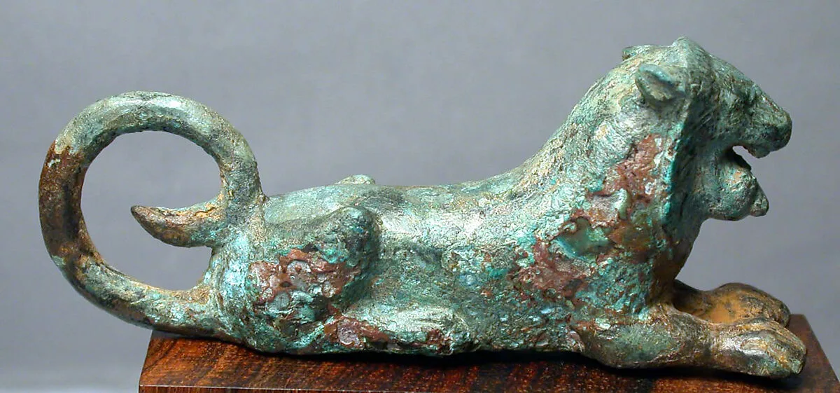 Bronze figure of a recumbent lion — Unknown
