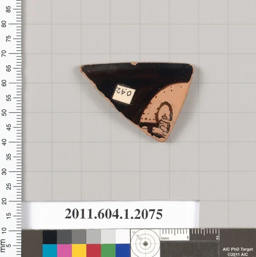 Terracotta rim fragment of a kylix (drinking cup)