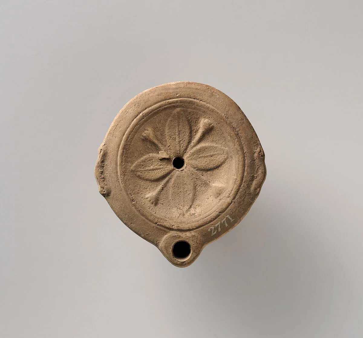 Terracotta oil lamp — Unknown