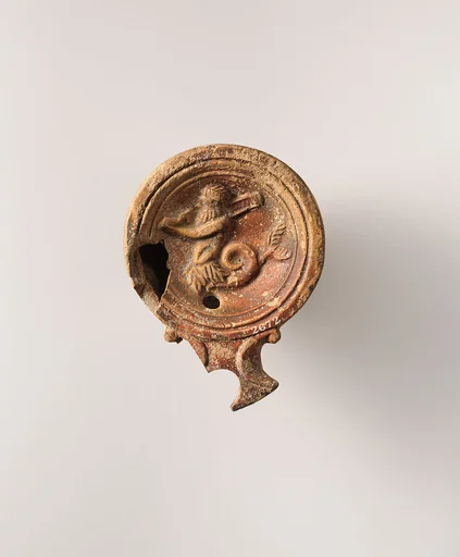 Terracotta oil lamp