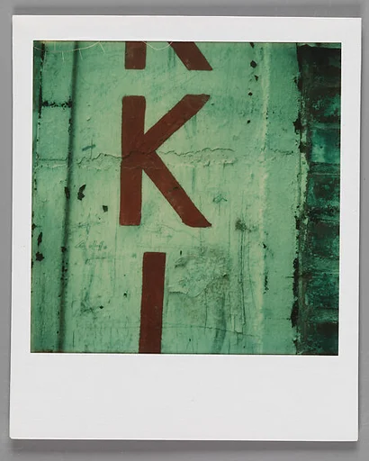 [Sign: "KI"]