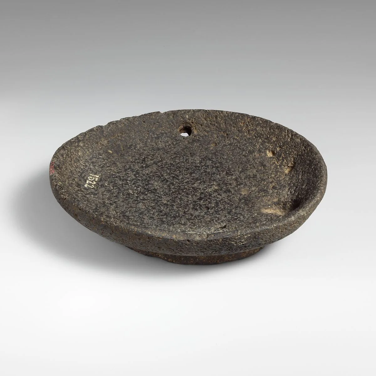 Vesicular basalt bowl — Unknown