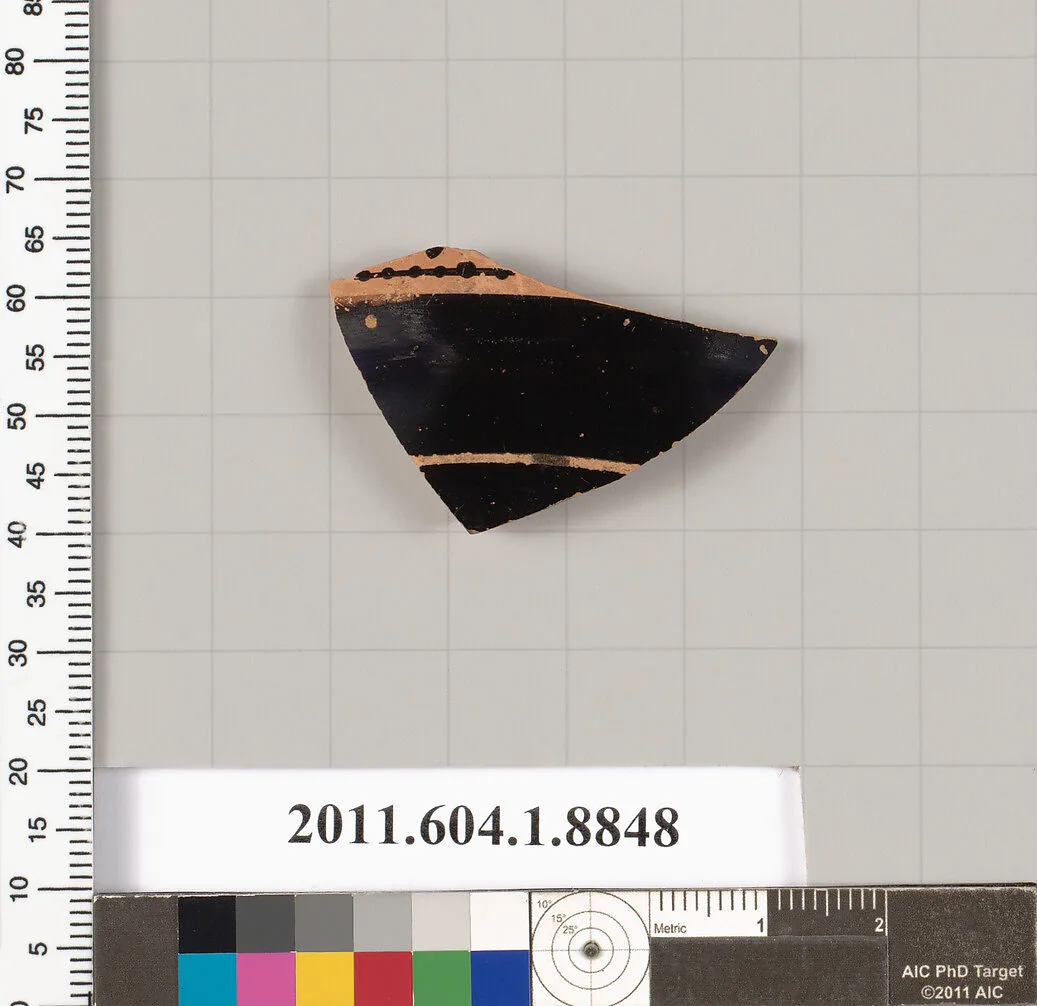 Terracotta fragment of a stemless kylix (drinking cup)? — Unknown