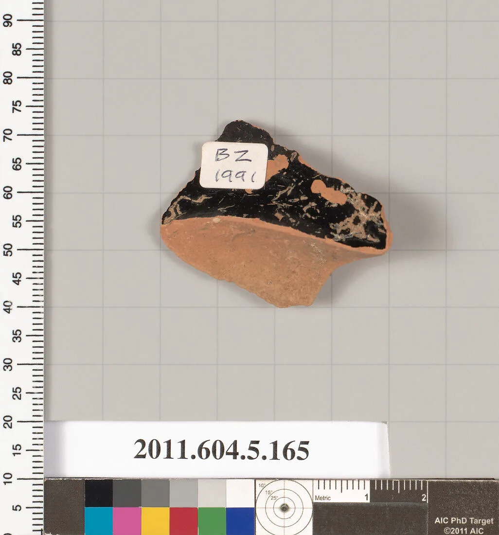 Terracotta rim fragment of a kylix (drinking cup)? — Unknown