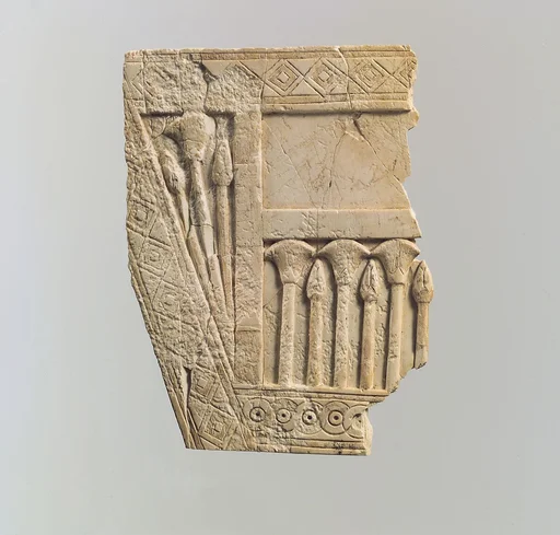Furniture plaque carved in relief with papyrus buds and flowers