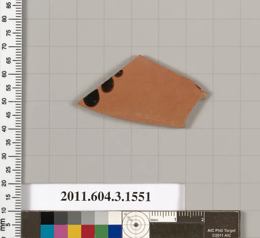Terracotta fragment of a kylix (drinking cup)