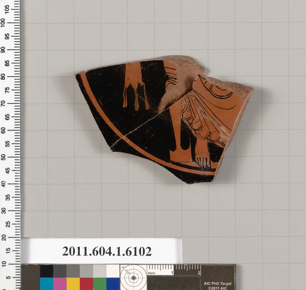 Terracotta fragment of a kylix (drinking cup) — Apollodoros