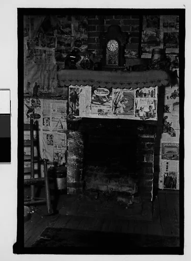 [Interior with Newspaper-Covered Fireplace, Hale County?, Alabama]