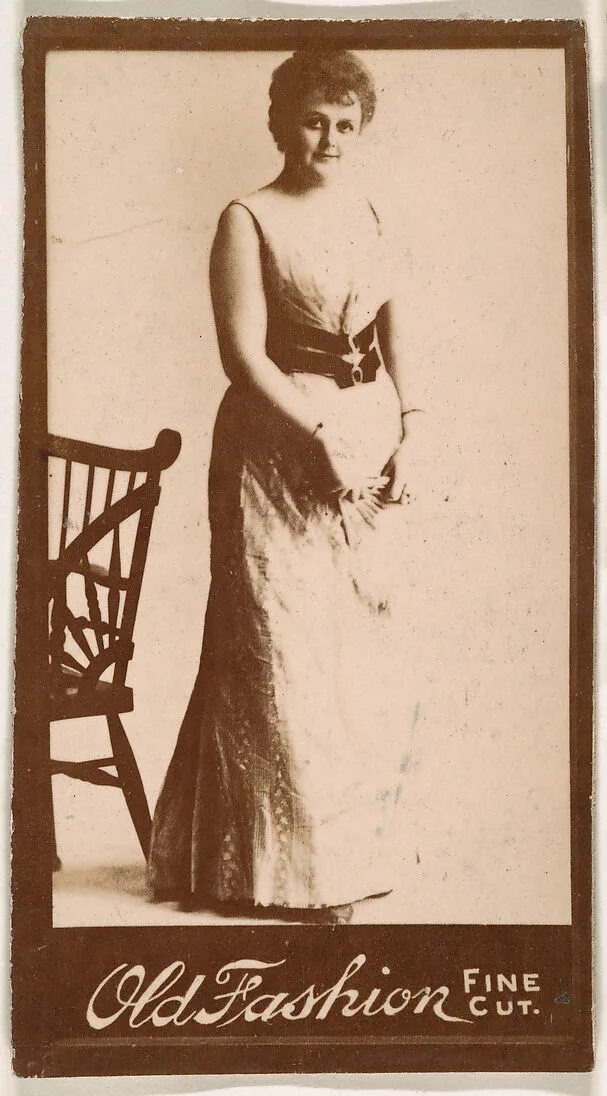 Actress standing next to chair, from the Actresses series (N664) promoting Old Fashion Fine Cut Tobacco — Unknown