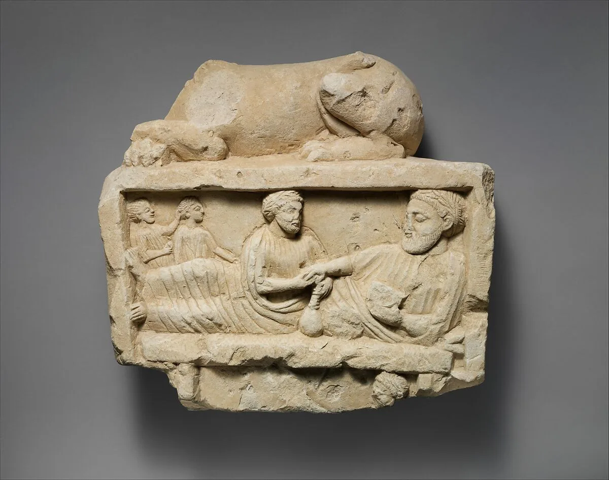 Limestone finial of a funerary stele with a recumbent lion and a banquet scene — Unknown