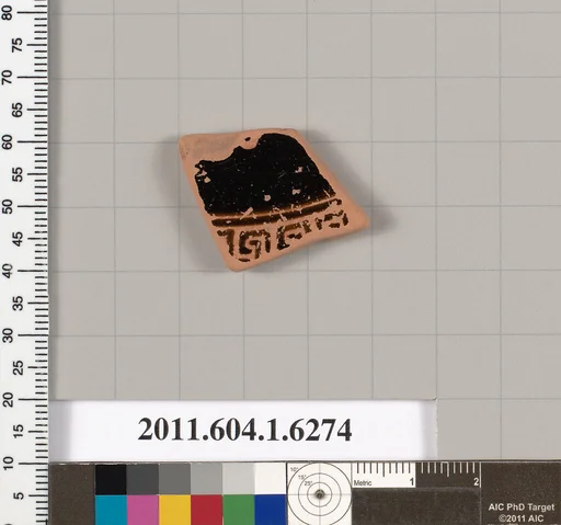 Terracotta fragment of a kylix (drinking cup)