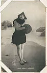 Bathing beauty with fur muff and hat from Mack Sennett Comedies Arcade series (W423) — Unknown