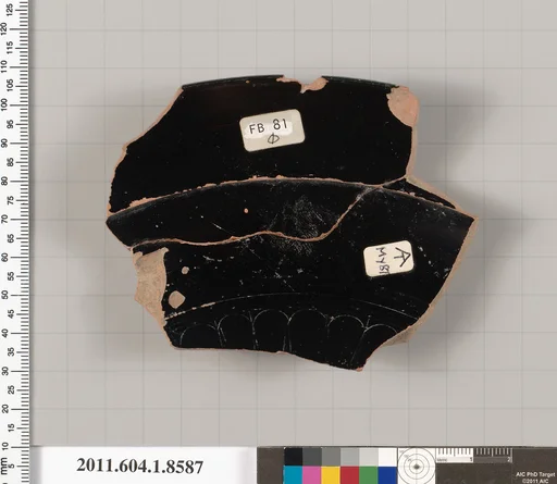 Terracotta rim fragment of a stemless kylix (drinking cup)