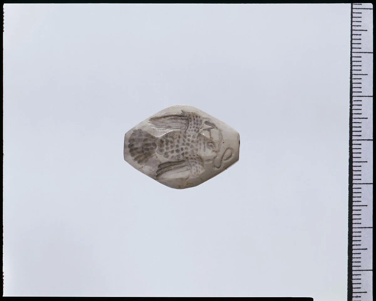 White stone engraved gem — Unknown
