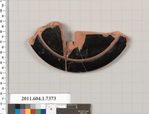 Terracotta fragment of a kylix (drinking cup)