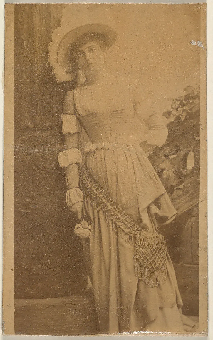 Actress leaning against column, from the Actresses series (N668) — Unknown