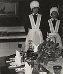 Parlourmaid and Under-Parlourmaid Ready to Serve Dinner — Bill Brandt