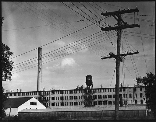 ["LEE HATS" Factory Building with Telephone Building in Foreground]
